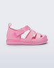 Side view of a pink Smash closed toe baby sandal