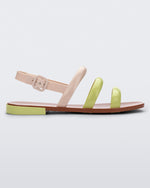 Side view of a beige and yellow Essential Wave women's sandal with adjustable buckle.