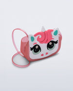 Angled view of a pink glitter Dreamy Unicorn kids bag with a unicorn face on front with pink hair