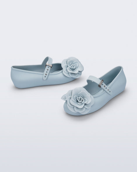 Side and angled view of a pair of blue Soft Ballerina Petals kids flats
