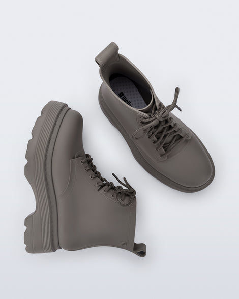 Top and side view of a pair of matte brown Coturno Soft Platform boots