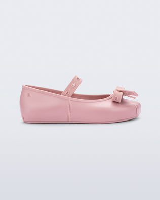Side view of a pink Sophie Crush kids ballerina flat with bow