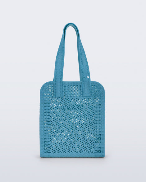 Back view of a blue Harper bag with shoulder straps