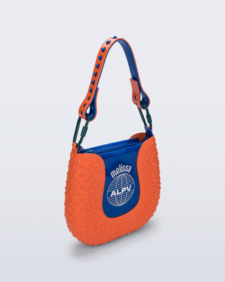 Product element, title Nina Bag in Orange/Blue
 price $189.00