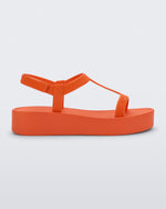 Side view of a orange Sun Capri Platform sandal with ankle strap