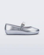 Side view of a pair of silver Soft Ballerina kids flat