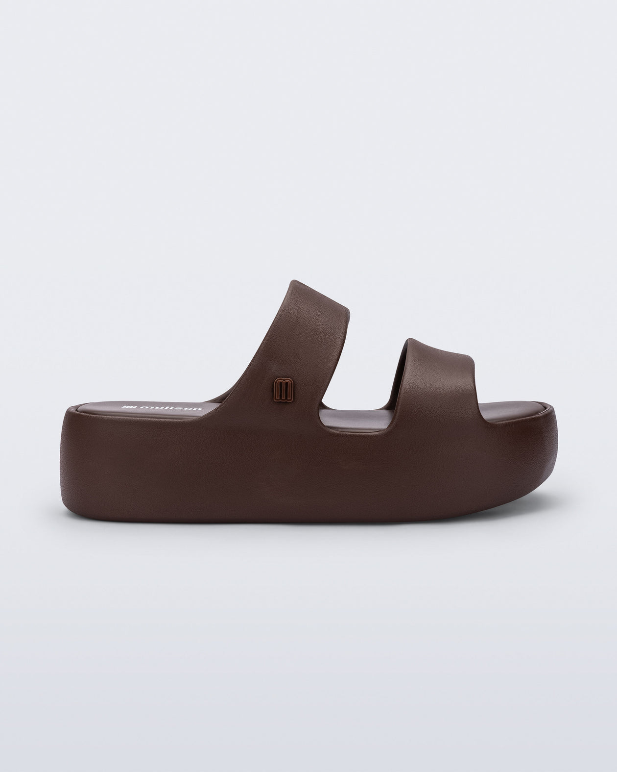 Side view of a brown Free Line Platform slide