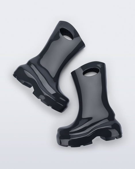 Top view of a pair of grey Ultra platform rain Boot with circle cutout on top