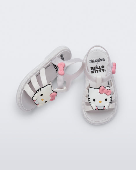Side view of a white Hip + Hello Kitty and Friends sandal with Hello Kitty on upper