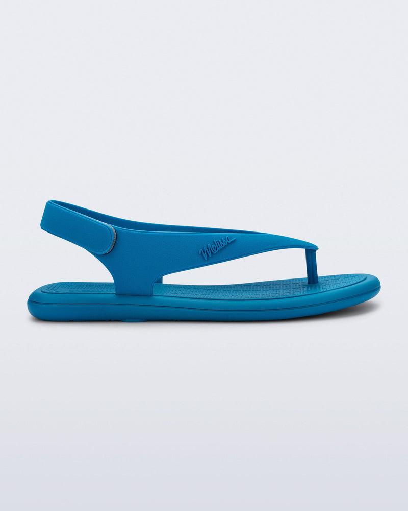 Side view of a blue Sun Samba thong sandal