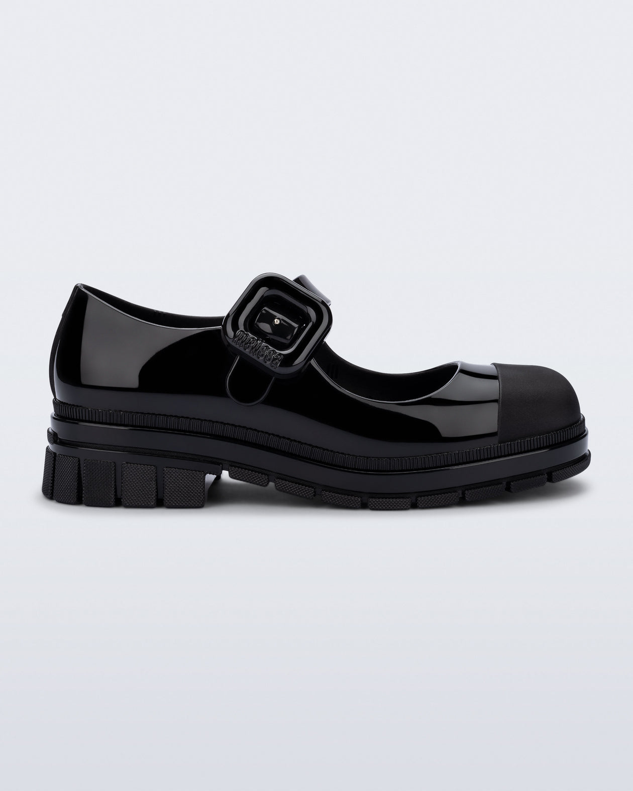 Side view of a black June mary jane with matte toe cap