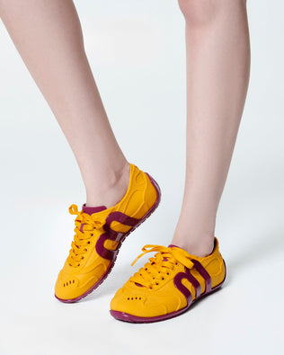 Product element, title Motion in Pink/Yellow
 price $99.00