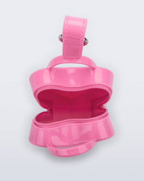 Top view of a pink Heartbeat Pocket bag charm