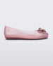 Side view of a glitter pink Mini Melissa Sweet Love Butterfly flat with a pink butterfly detail on the toe