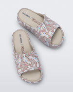 Top view of a pair of beige Free Platform slides + Hello Kitty and Friends kids sandals with Hello Kitty and Friends print