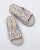 Top view of a pair of beige Free Platform slides + Hello Kitty and Friends kids sandals with Hello Kitty and Friends print