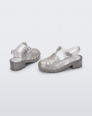 Product element, title Possession Heel in Clear/Glitter Gold
 price $79.00