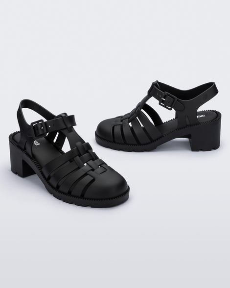 Angled view of a pair of black Possession Heel women's fisherman style sandals.