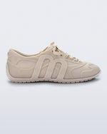 Side view of a beige Motion Sneaker 