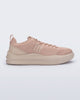 Side view of a pink X Mood sneaker