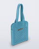 Angled view of a blue Harper bag with shoulder straps