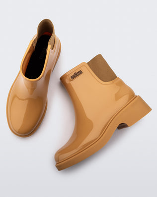 top and side view of a pair of caramel Chelsea boots