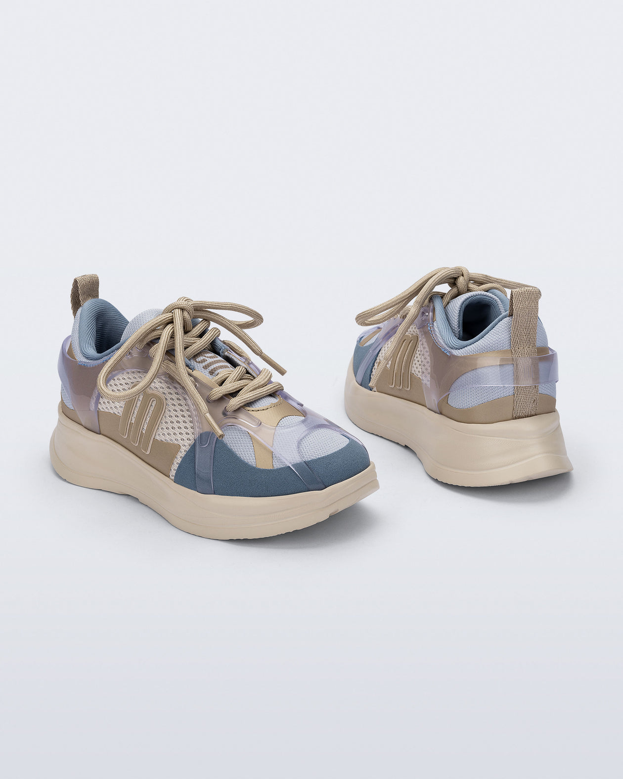 Back and angled view of a pair of blue X Beat kids sneakers with beige trim