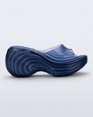 Side view of a clear blue Quantum Silver sandals