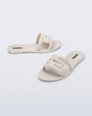 Product element, title M Slide in Beige
 price $59.00