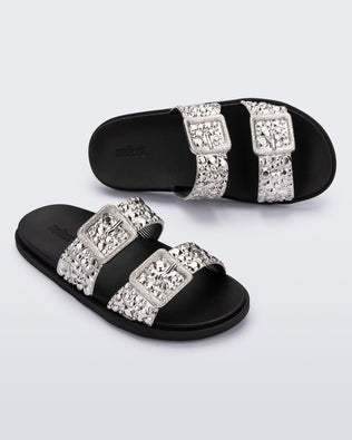 Product element, title Lust Slide in Onyx Black
 price $24.50