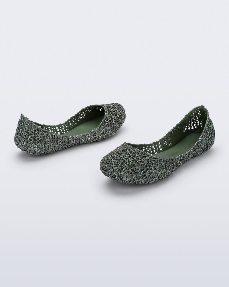 Angled view of a pair of glitter green Campana kids flats