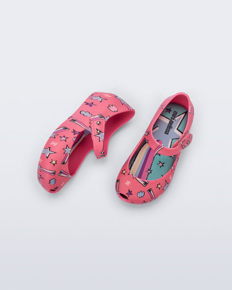 Top and side view of a pair of pink Ultragirl Colors baby flats with shooting stars