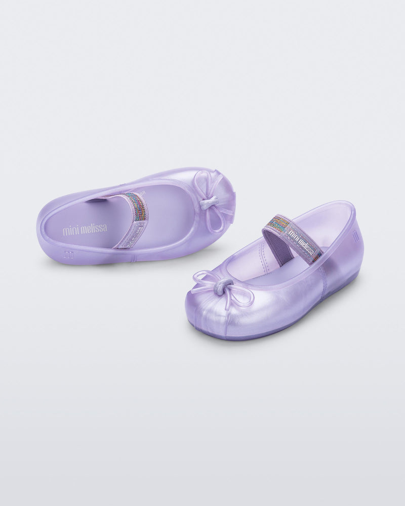 Angled view of a pair of lilac baby Sophie flats
