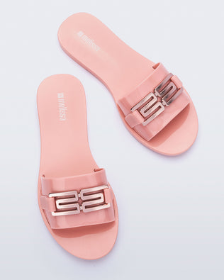 Top view of a pair of pink Babe M Chic slide sandals