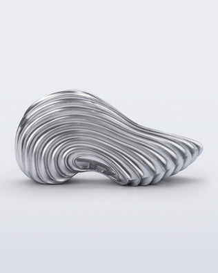 Side view of a silver Quantum Sneaker