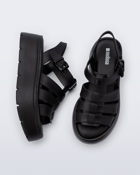 Top and side view of a pair of black Up Platform sandals
