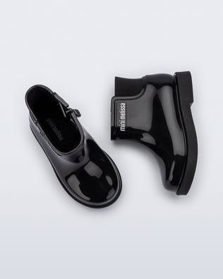 Top and side view of a pair of black Chelsea II baby boots