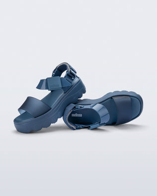 Product element, title Kick Off Sandal in Blue/Blue
 price $125.00