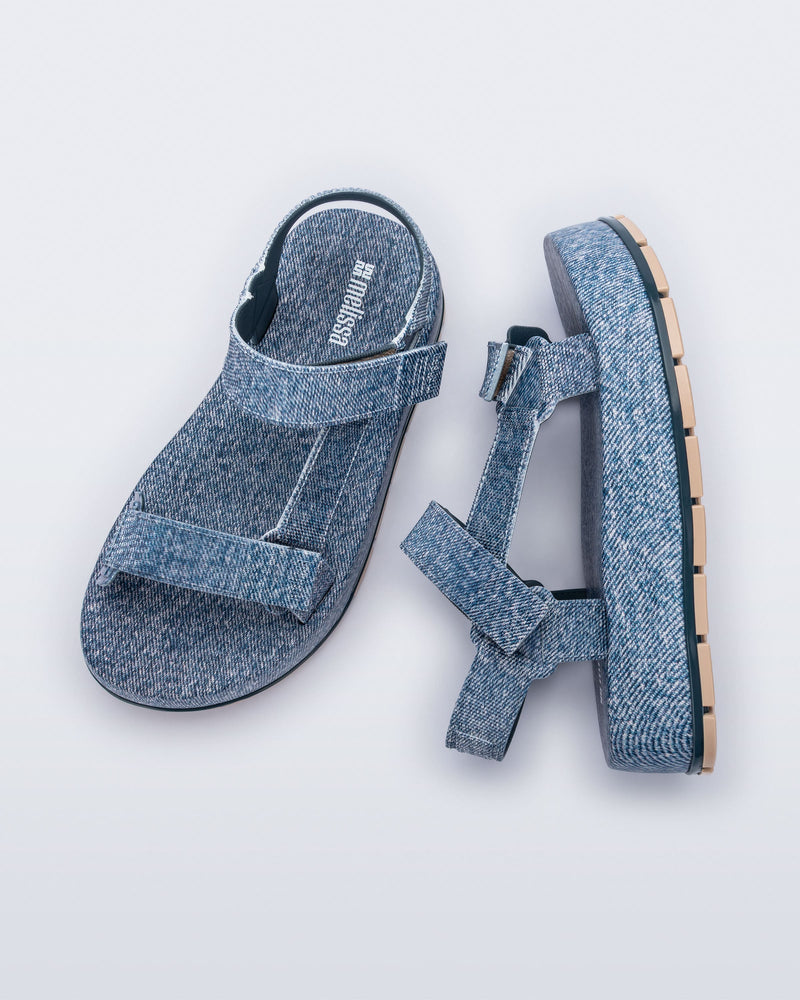 Top and side view of a pair of blue jean Flowing Denim platforms