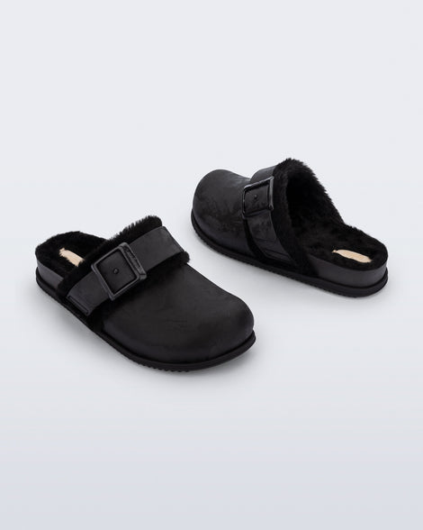 Back and angled view of a pair of black Cozy Warm Clogs with fuzzy insoles