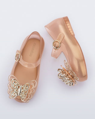 Top and side view of a pair of gold Sweet Love Butterfly baby flats