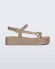 Side view of a beige glitter Sun Downtown Platform sandal