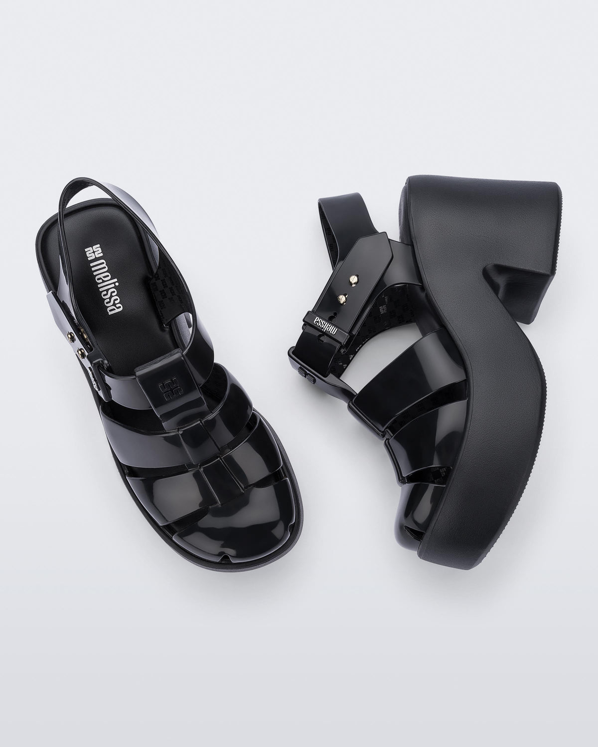 Top and side view of a pair of black Lulu platform heel fisherman sandals