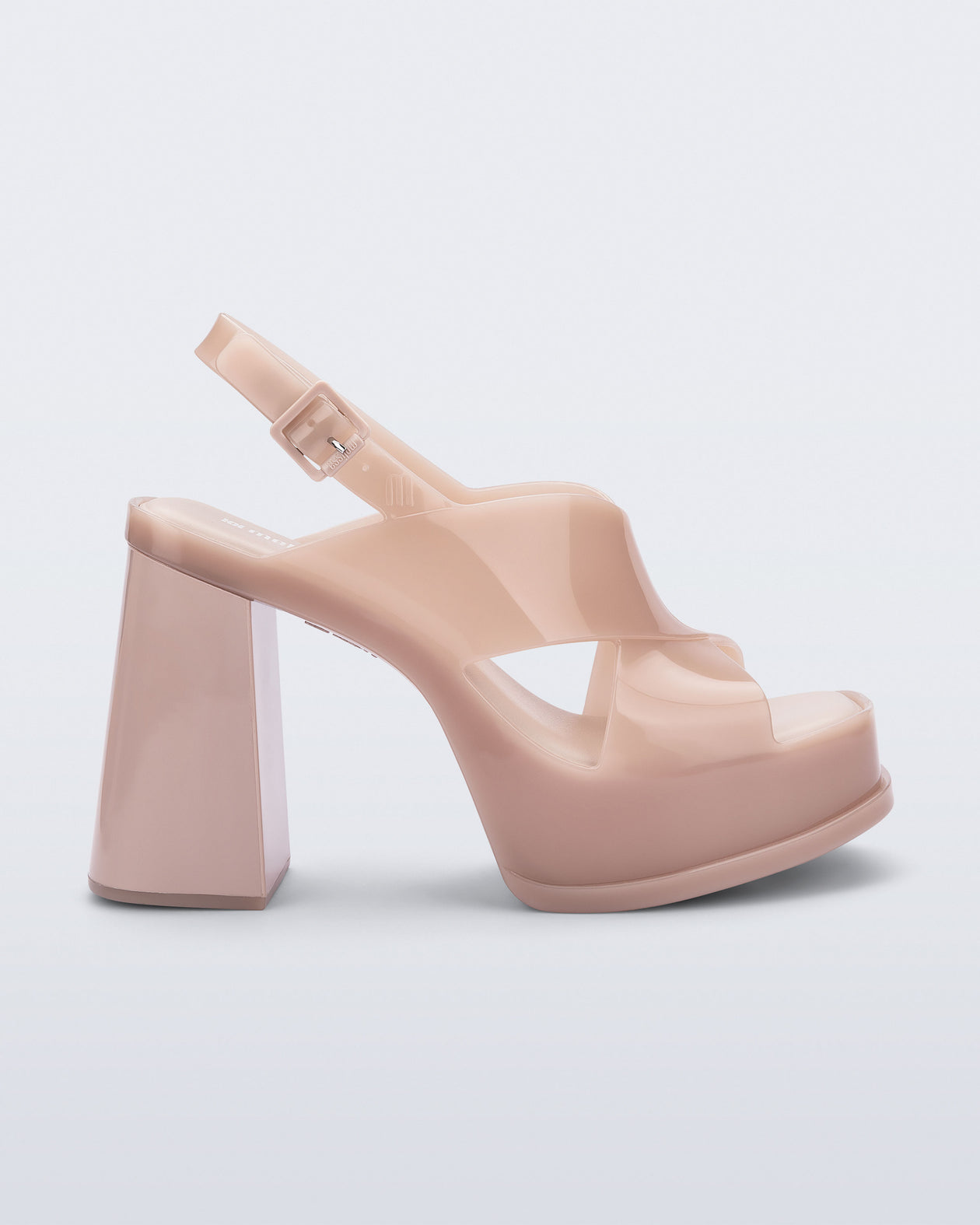 Side view of a milky pink Dance Heel platform with back adjustable strap