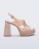 Side view of a milky pink Dance Heel platform with back adjustable strap
