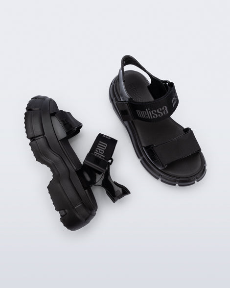 Top and side view of a pair of black Pulse platform sandals with straps