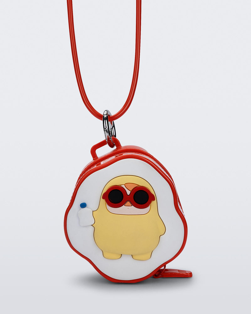 Front view of a red Bag + Pop Mart Pucky small bag with short strap