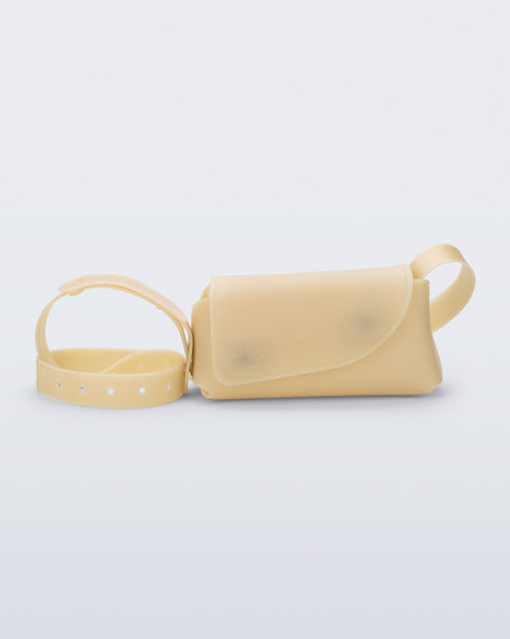 Front view of a beige Cross Bag with adjustable strap
