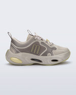Side view of an beige X Loop sneaker