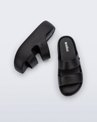 Top and side view of a pair of black Free Line Platform slides